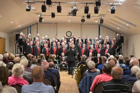Choir in 1st Half with a full house.jpg